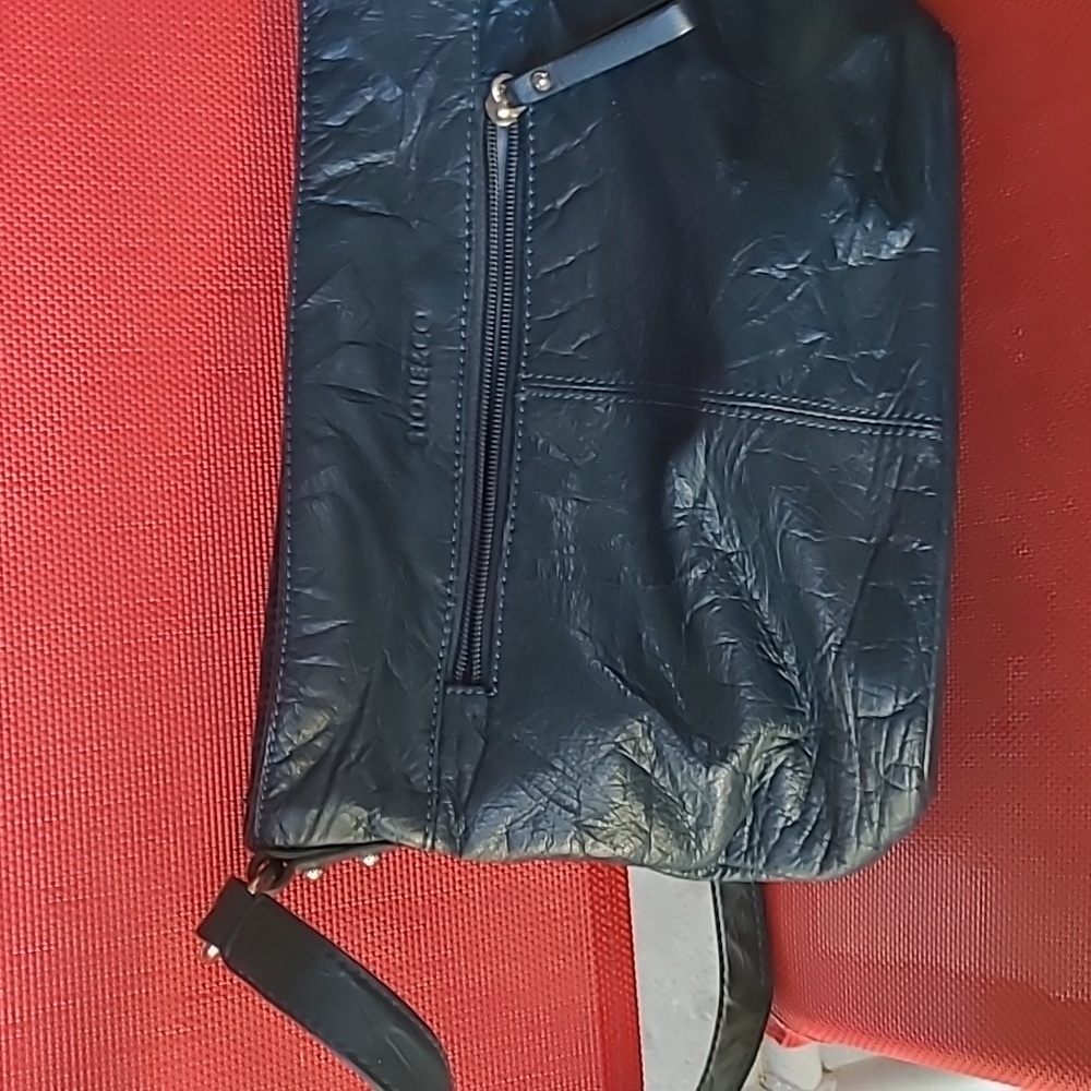 Multipockets dark blue purse